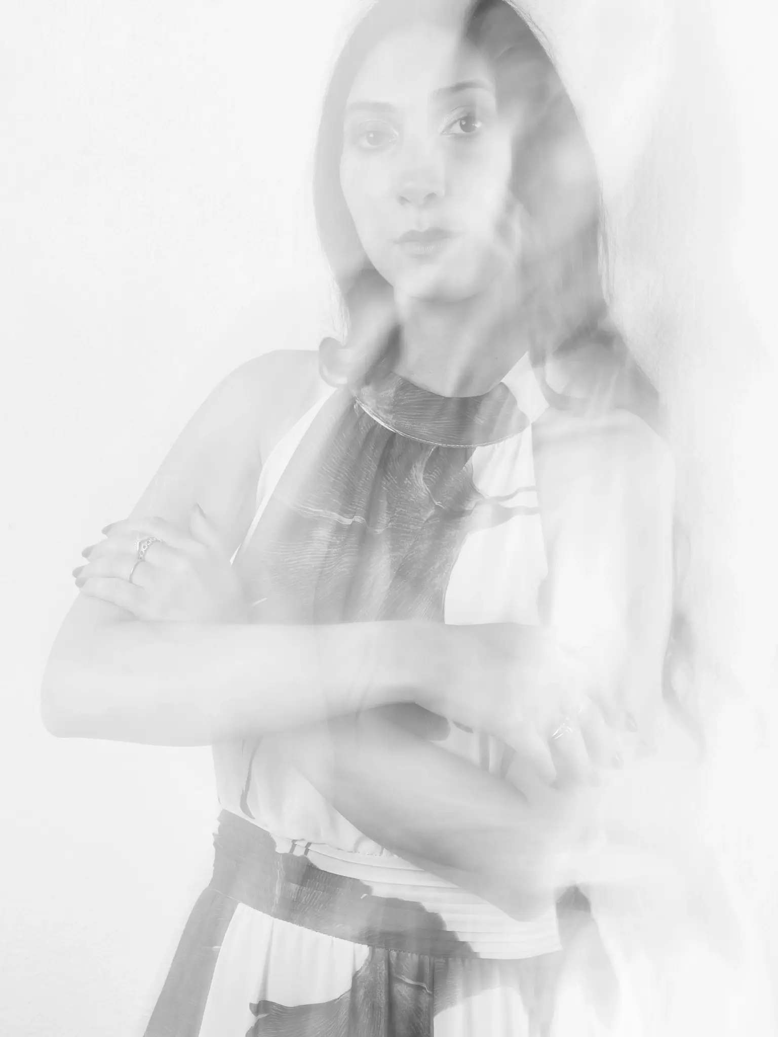 (e)Motion - Long Exposure black and white portrait of model with floreal dress (e)Motion - Long Exposure black and white portrait of model with floreal dress