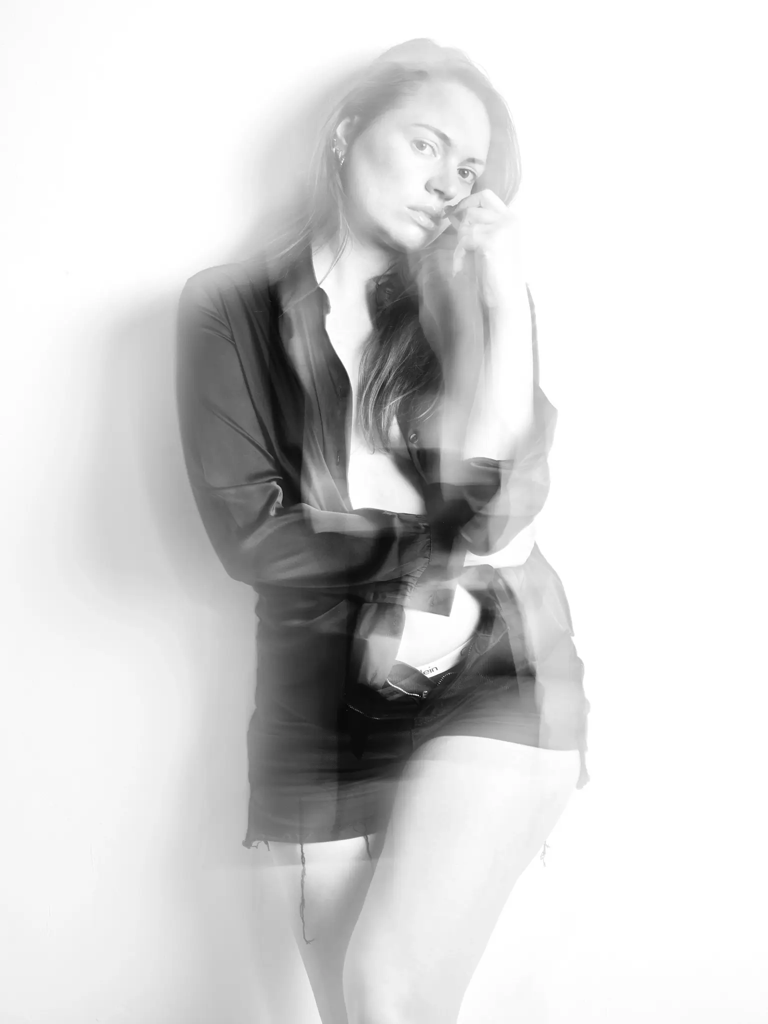 (e)Motion - Long Exposure black and white portrait of model with black shirt and shorts (e)Motion - Long Exposure black and white portrait of model with black shirt and shorts