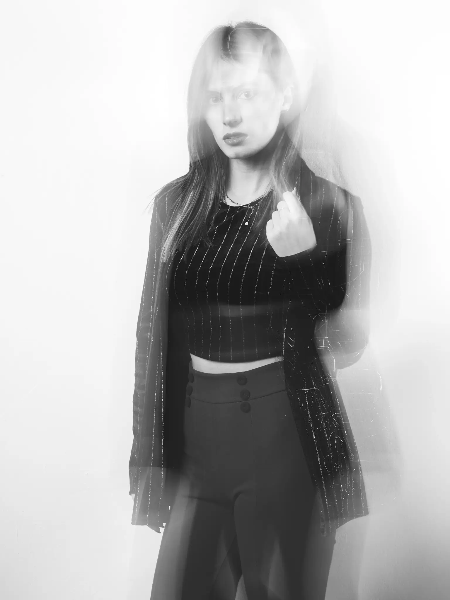 (e)Motion - Long Exposure black and white portrait of model with black dress (e)Motion - Long Exposure black and white portrait of model with black dress