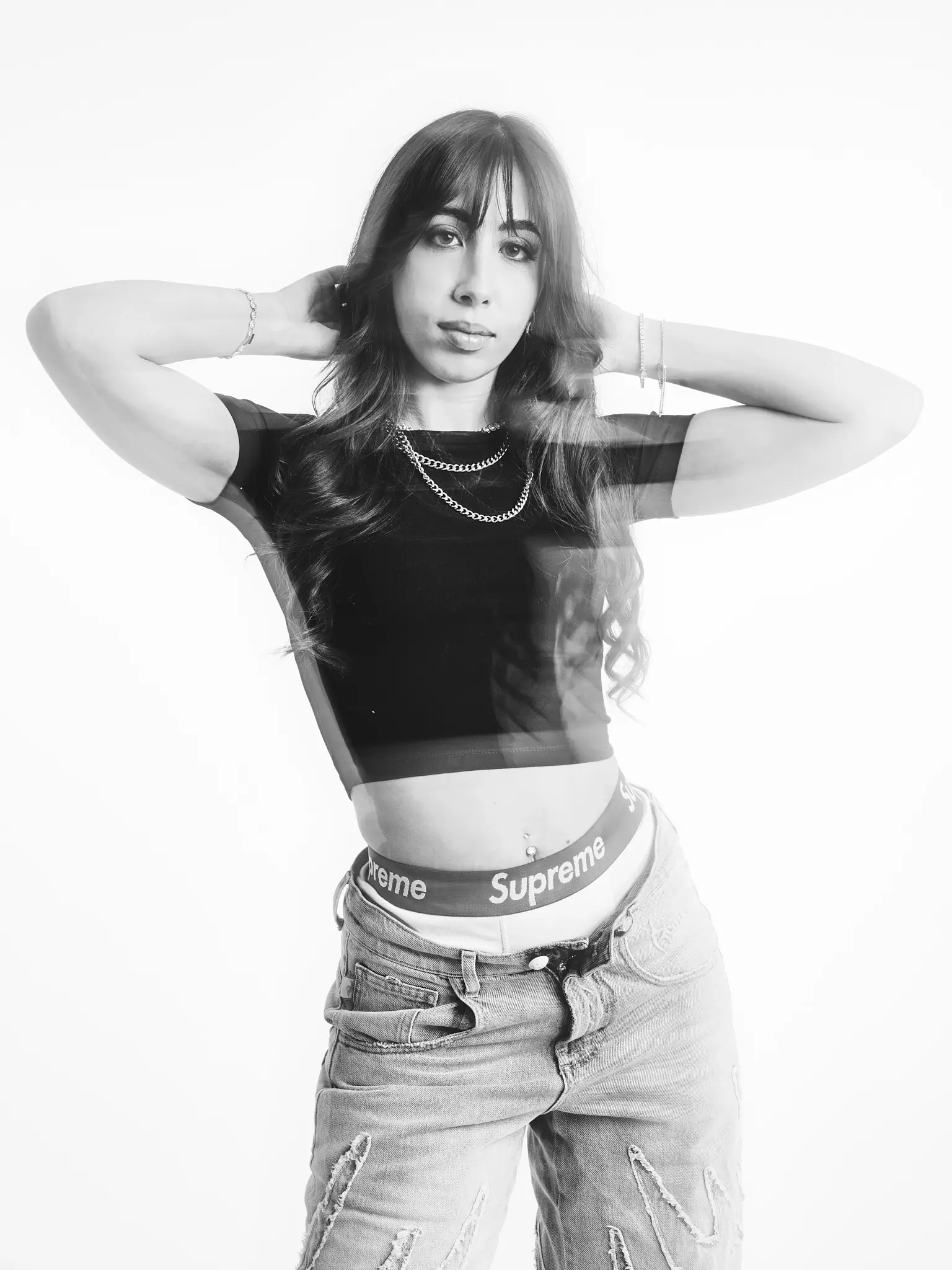 (e)Motion - Long Exposure black and white portrait of model with black tee and jeans (e)Motion - Long Exposure black and white portrait of model with black tee and jeans