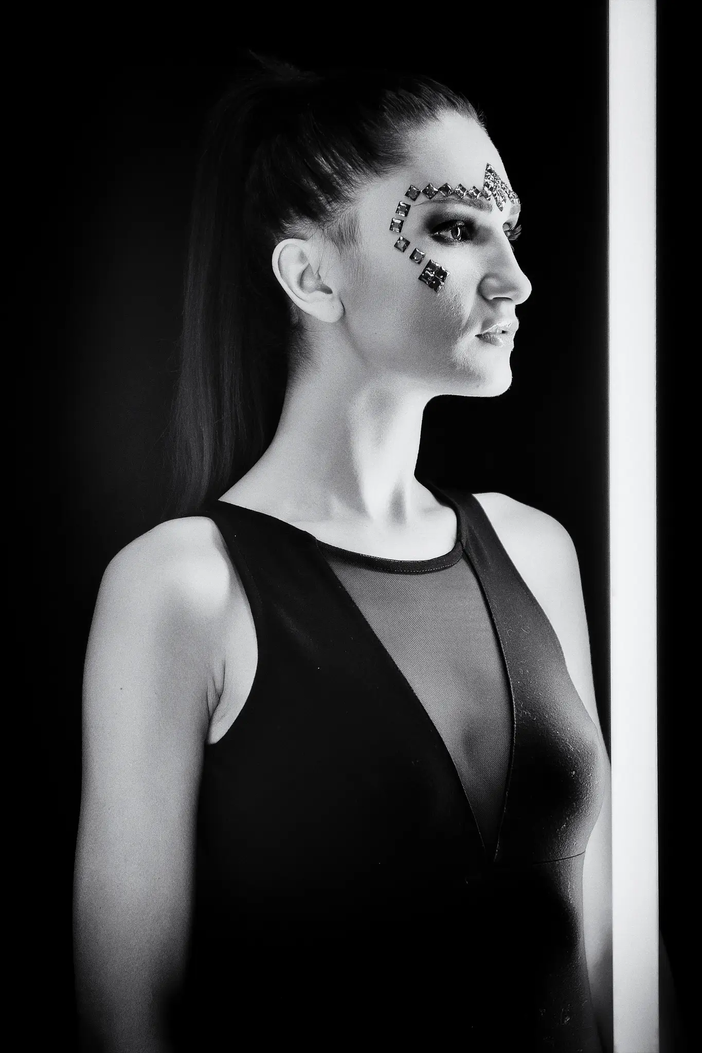 Black and white portrait of model in a futuristic makeup