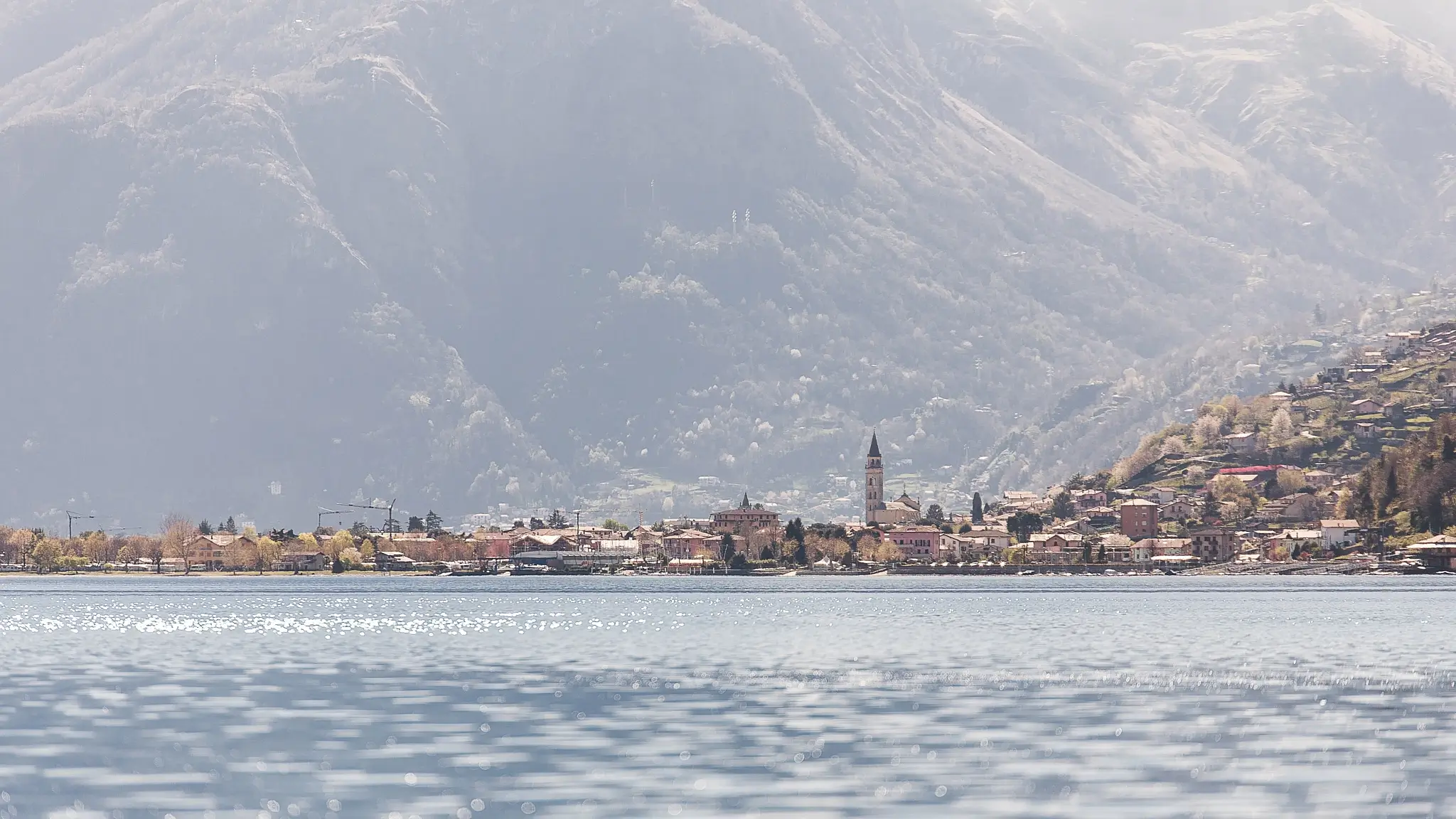 Landscape view of the lake with a town 