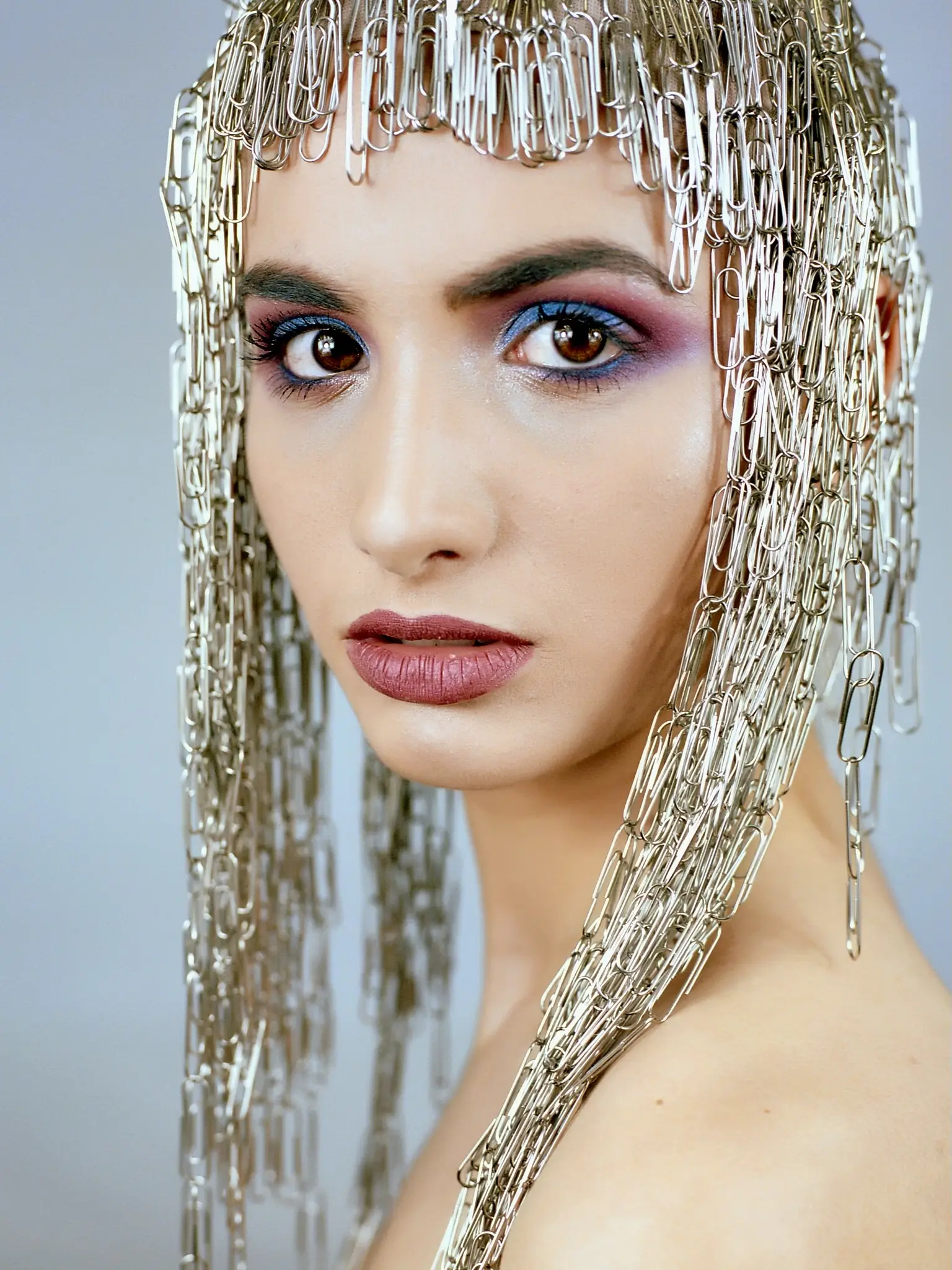 Studio portrait of a model with paperclips wig