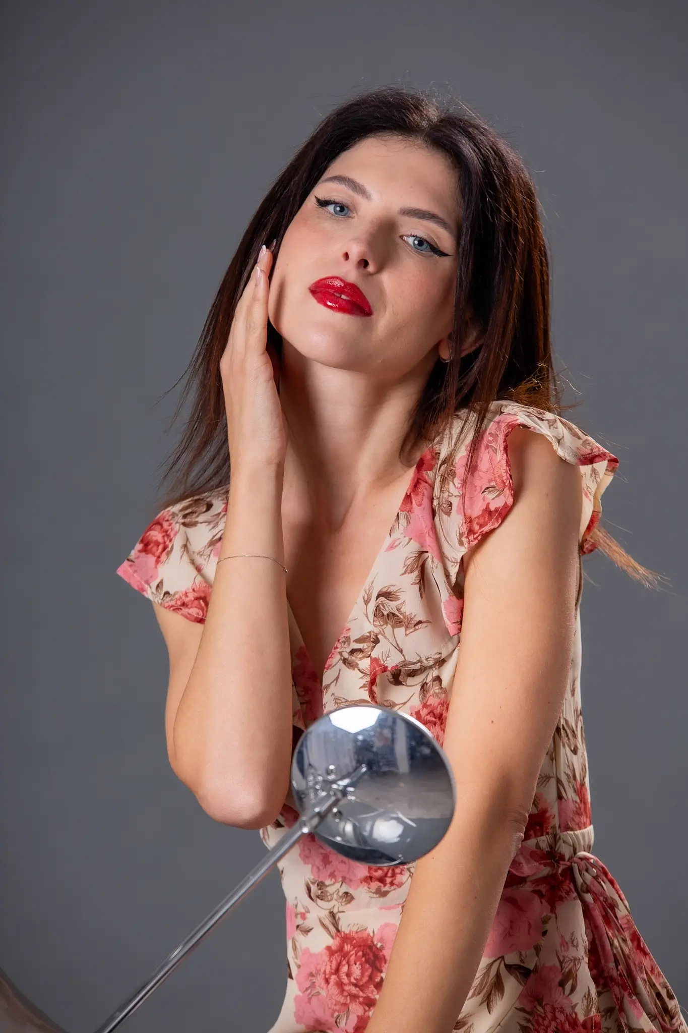 Closeup shot of model Martina wearing a colored dress during a workshop